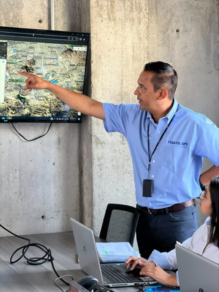 Partner Spotlight: Tesatel GPS employee presenting gps map on screen