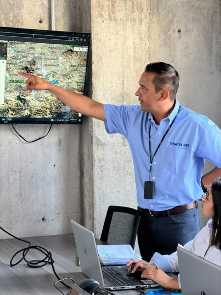 employee presenting gps map on screen